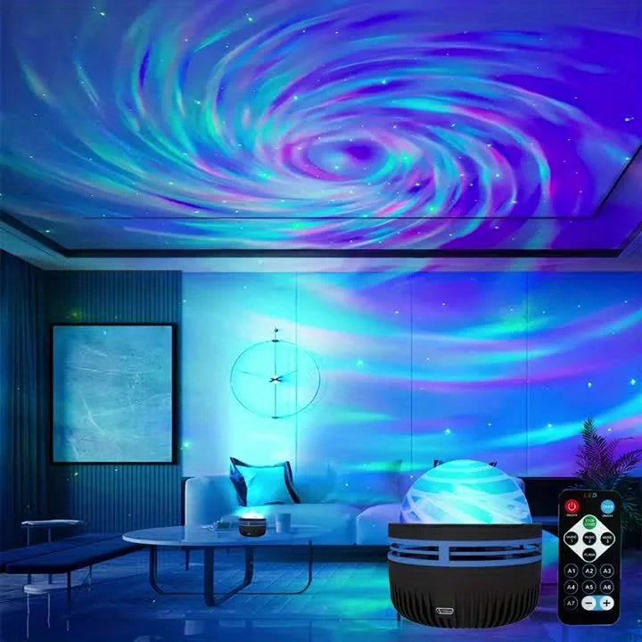A glowing spherical projector lamp on a table in a modern living room, with a remote control shown in the lower right corner. The room is illuminated by a vivid blue and purple galaxy spiral pattern projected on the ceiling and wall.
