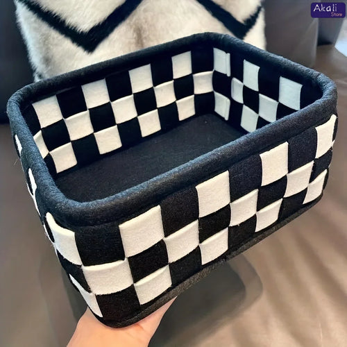 Black and white checkered fabric storage basket