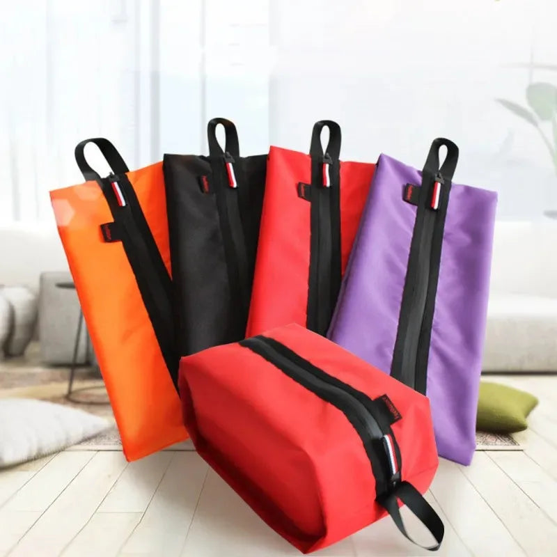 Zippered travel storage bags in orange, red, black and purple