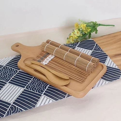 Bamboo sushi rolling mats, chopsticks, rice paddle and spreader